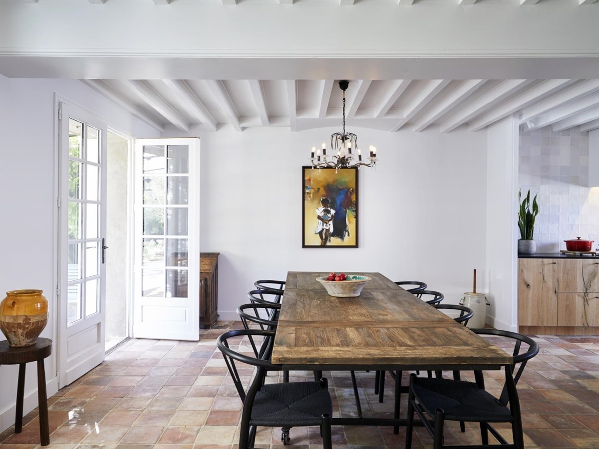 dining room with long wooden table at pomiera, france
