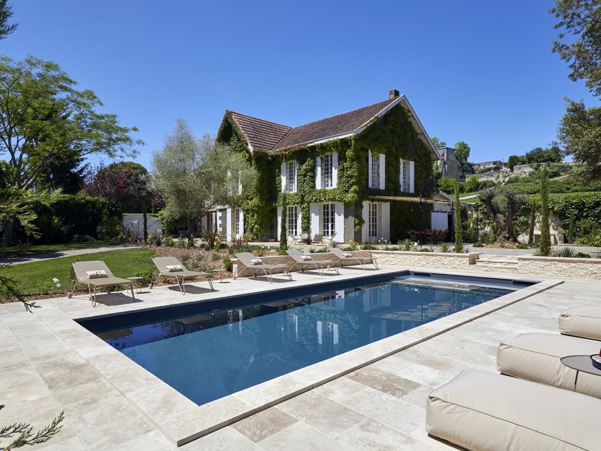 pool with the villa in the background at pomiera, france