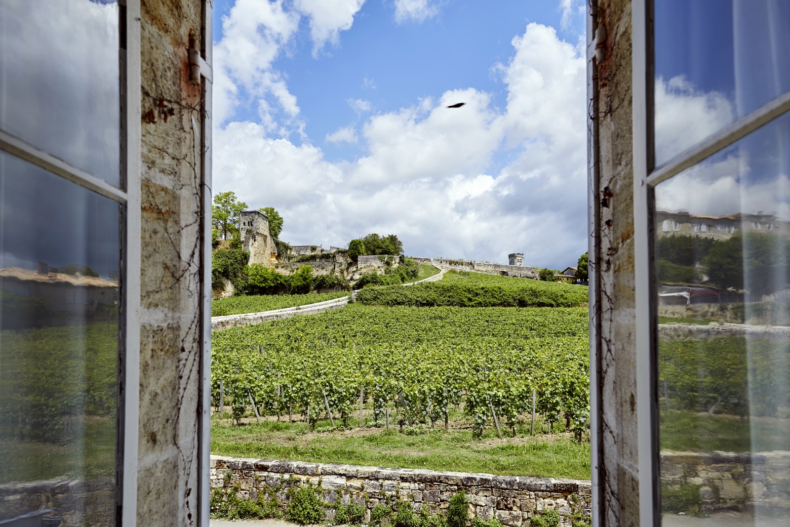 view over fields from window at pomiera, france