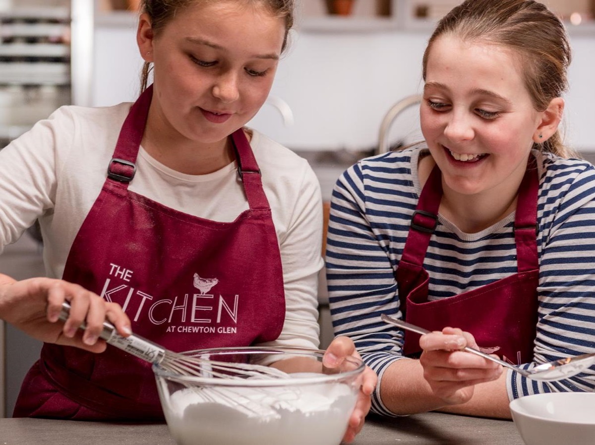 Children enjoying a cookery class at Chewton Glen in the New Forest UK