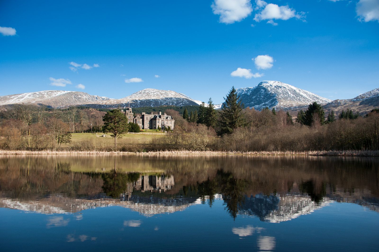 Loch and highlands surroundings of the Inverlochy Castle Hotel in Scotland