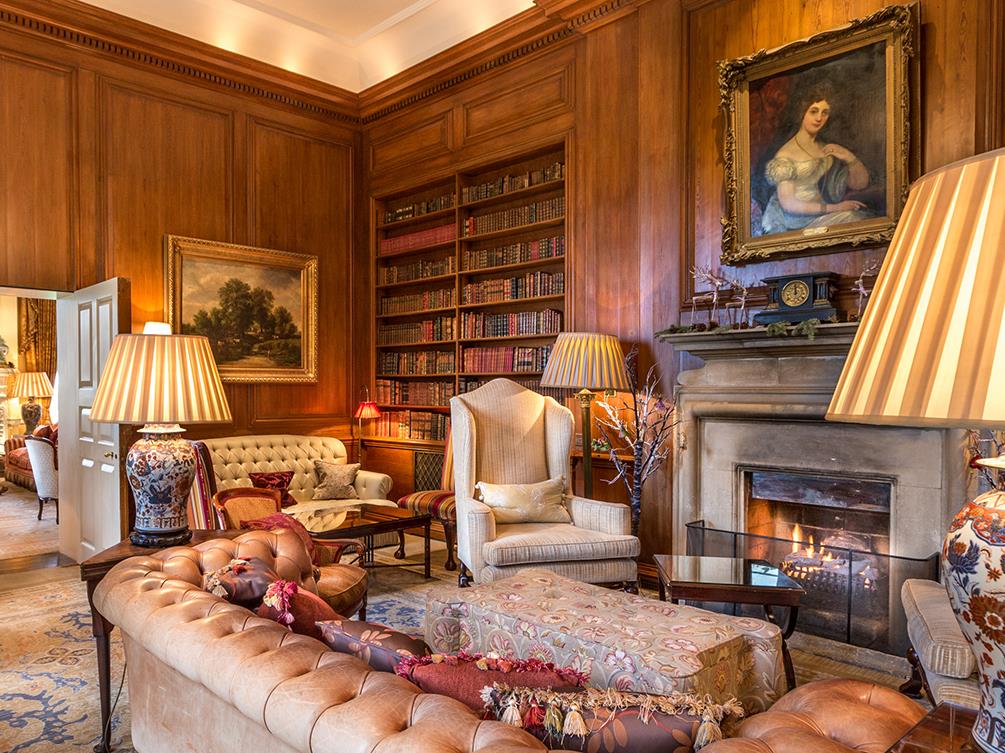 The drawing room and library at Lucknam Park hotel in the Cotswolds England