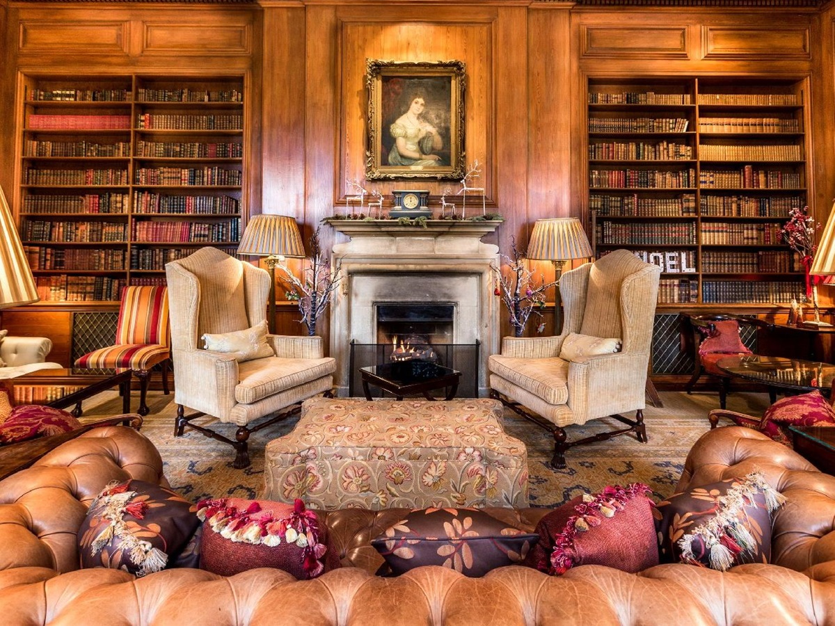 The library and fireplace at Lucknam Park hotel in the Cotswolds England