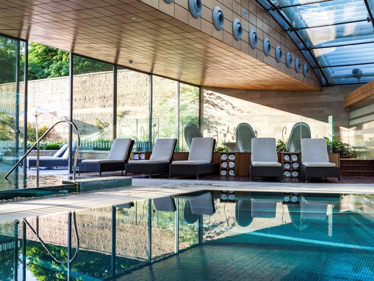 Indoor pool in the spa complex at Lucknam Park hotel in the Cotswolds England