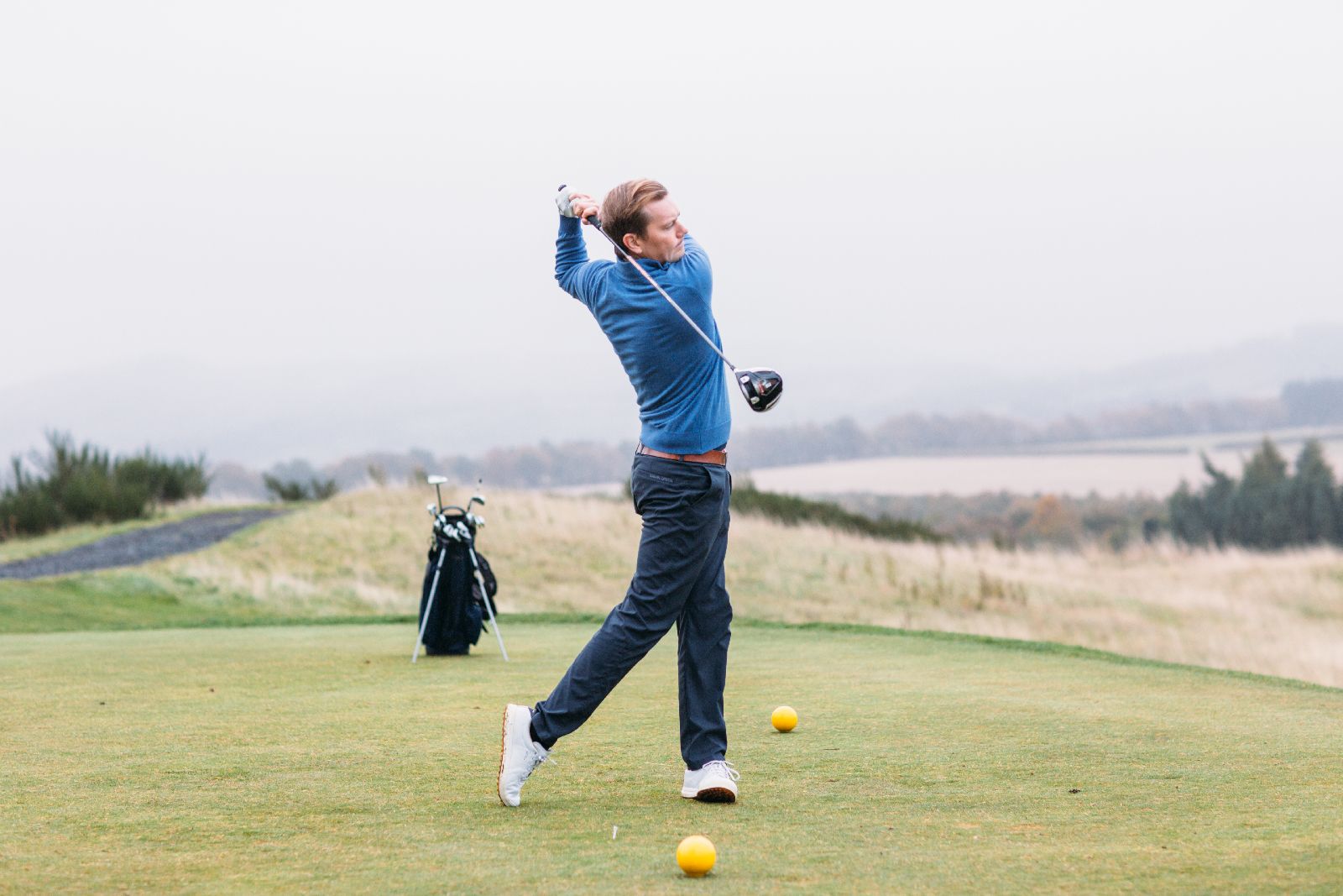 Golfer enjoying the championship course at Gleneagles in Scotland