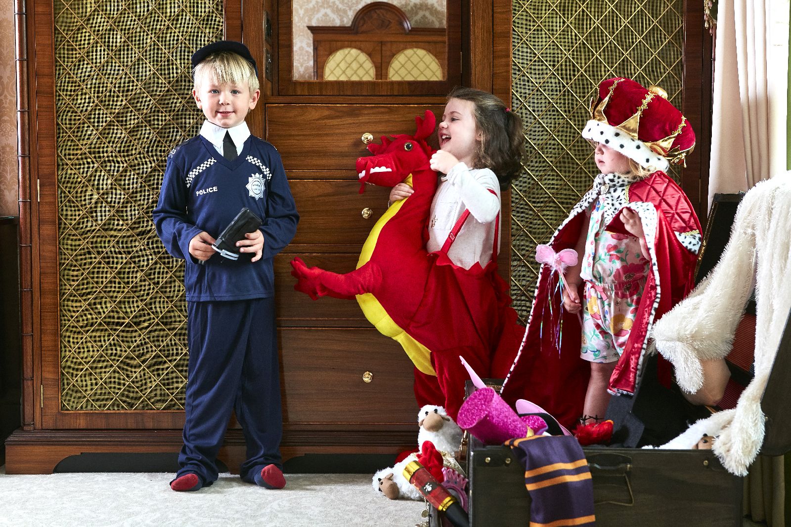 Children enjoying the dressing up box at The Goring hotel in London England