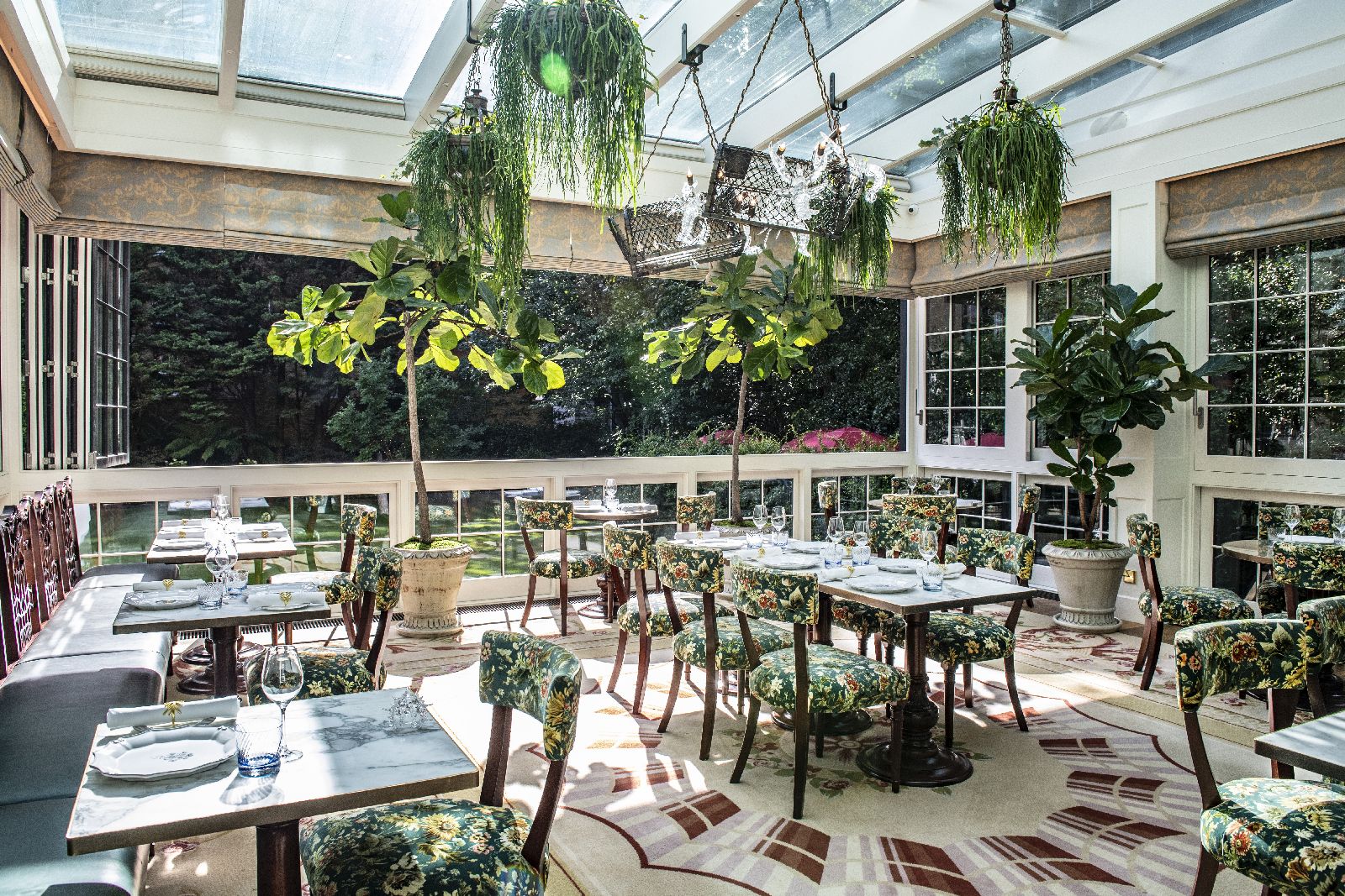 Light filled garden restaurant at The Goring hotel in London England