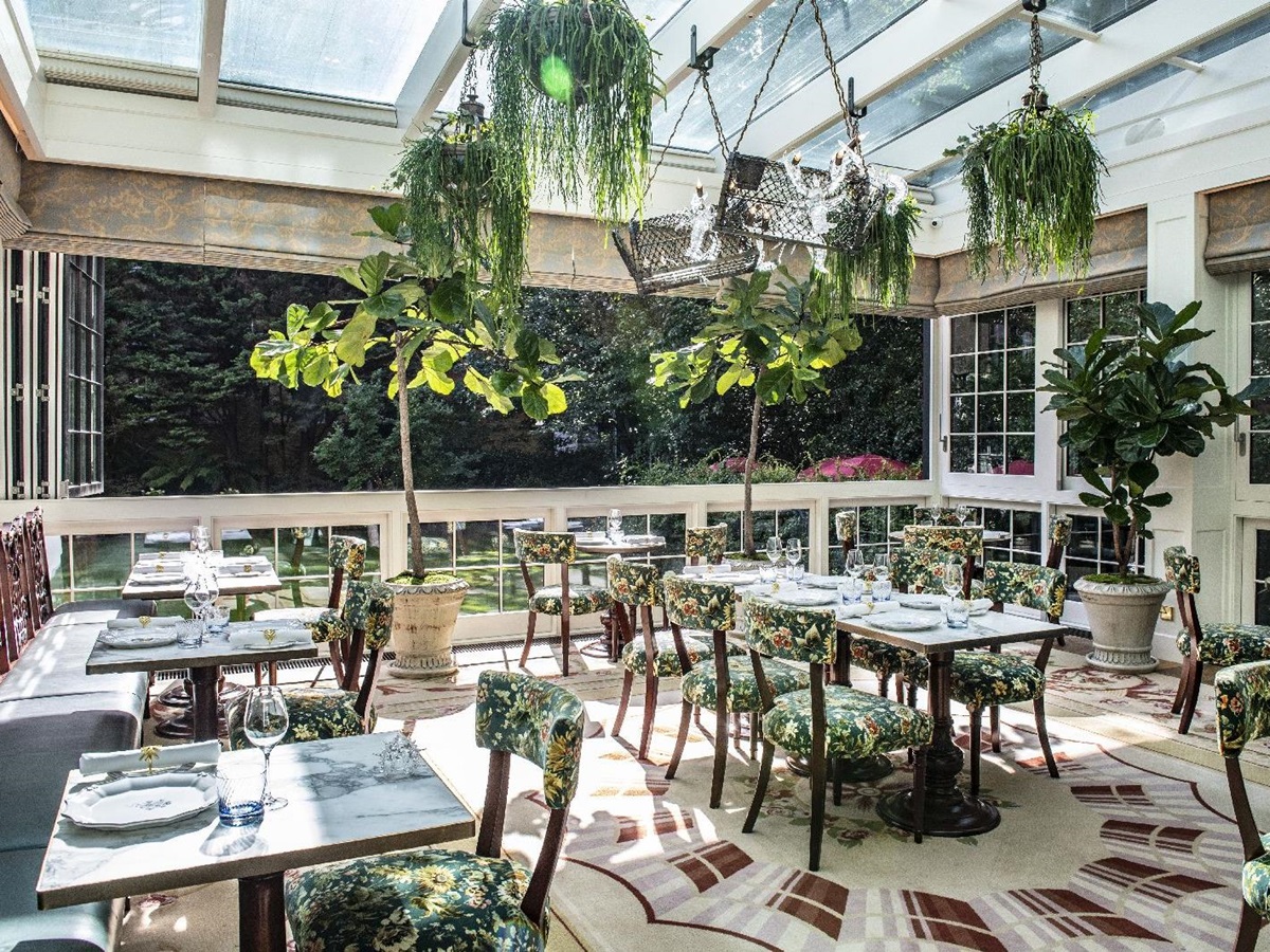 Light filled garden restaurant at The Goring hotel in London England