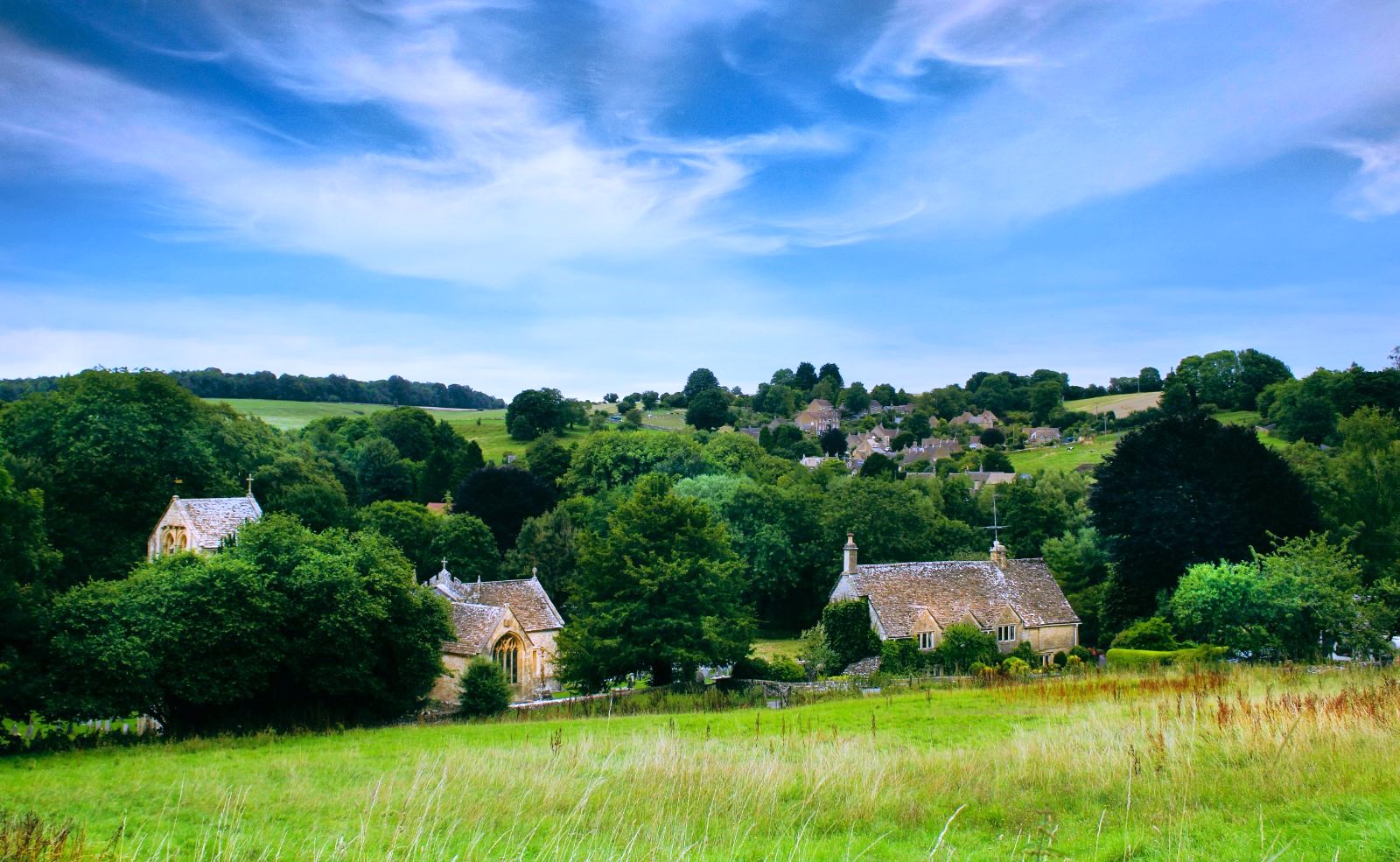 Cottages amongst the fields in The Cotswolds, United Kingdom
