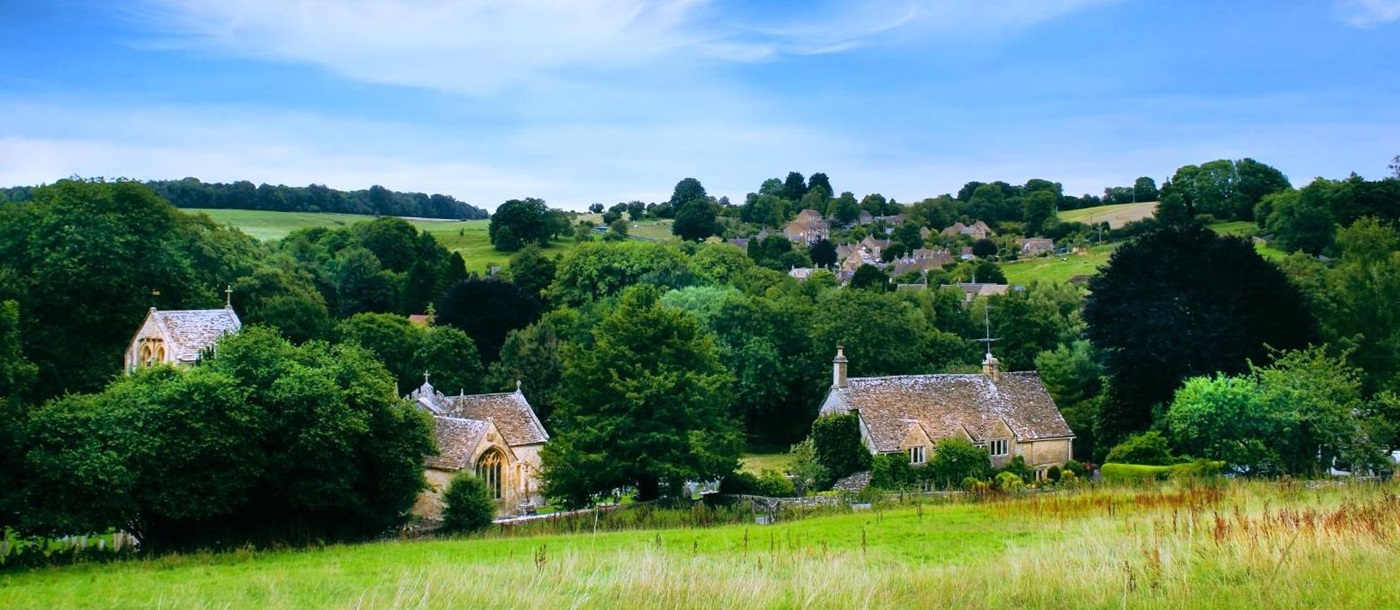 Cottages amongst the fields in The Cotswolds, United Kingdom