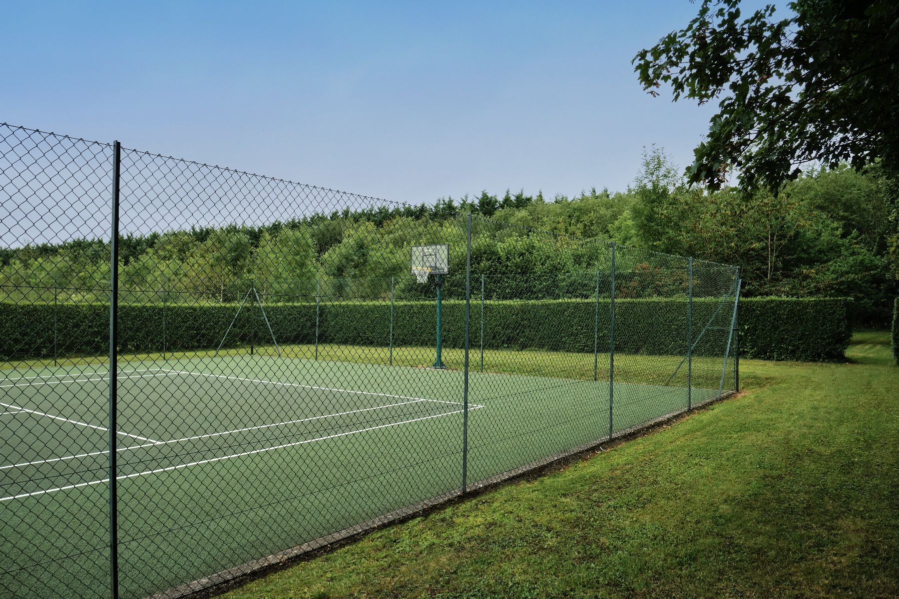 Tennis court at Cirencester Park in the Cotswolds, United Kingdom