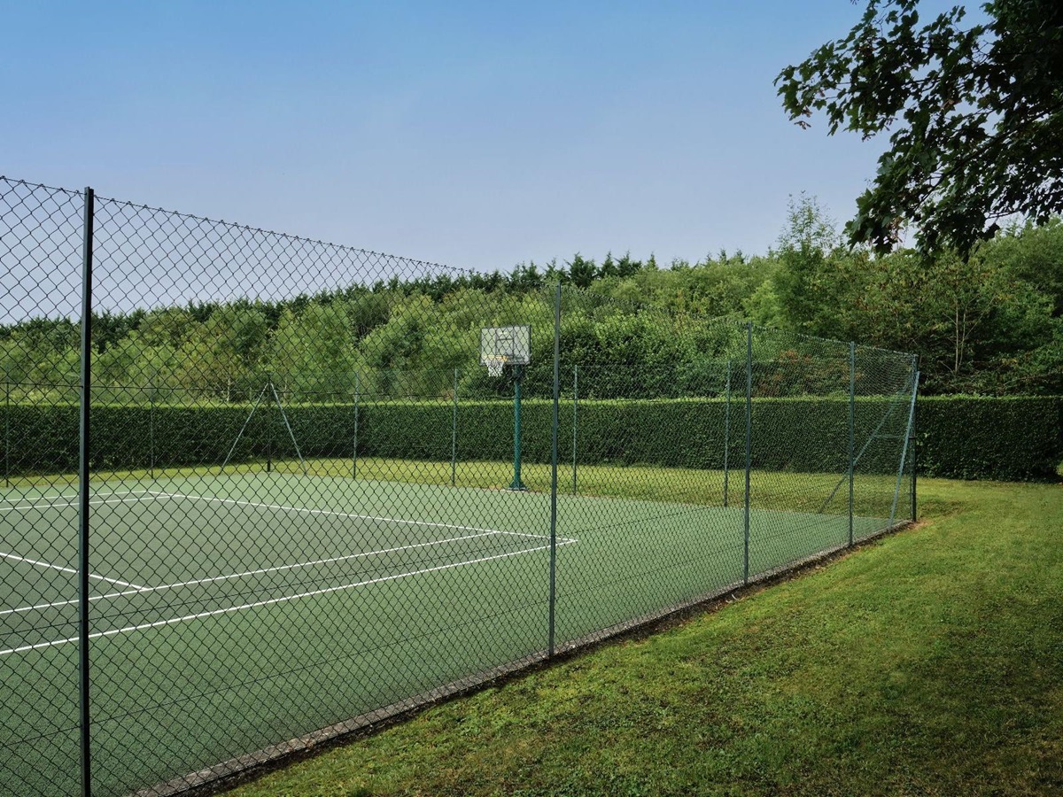 Tennis court at Cirencester Park in the Cotswolds, United Kingdom