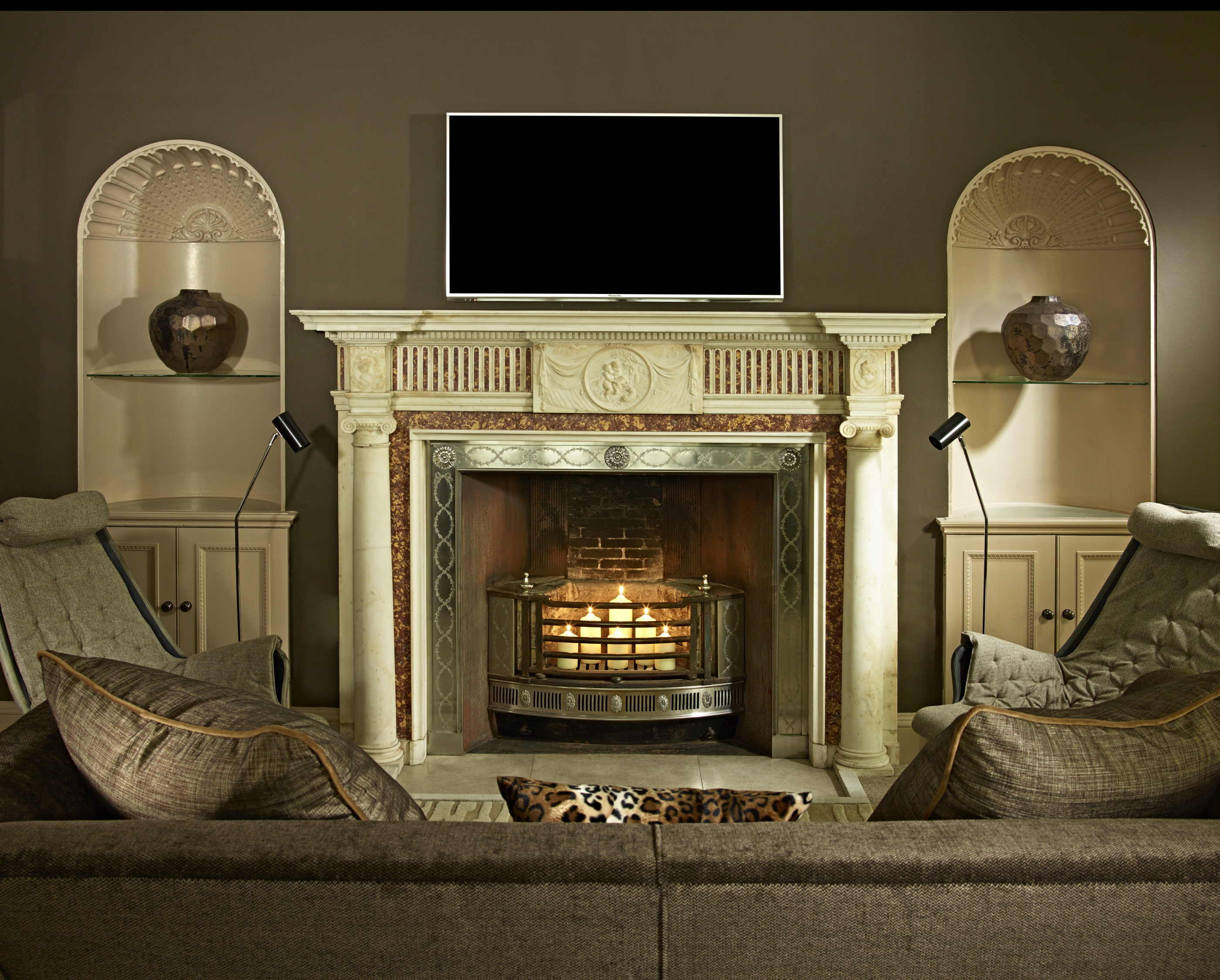 Living room with fireplace in Foxhill Manor, Cotswolds
