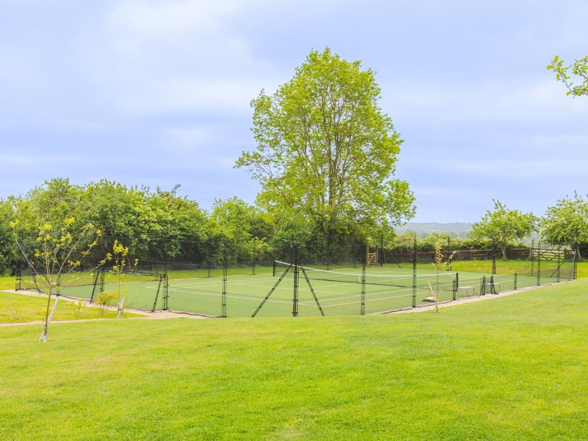 Tennis court at Oddington Farm in the Cotswolds, United Kingdom