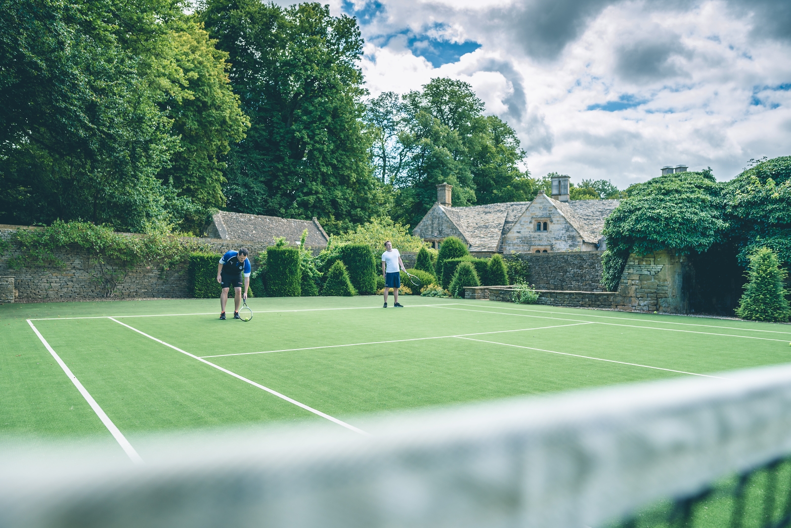 Tennis court at Temple Guiting Manor in the Cotswolds, England