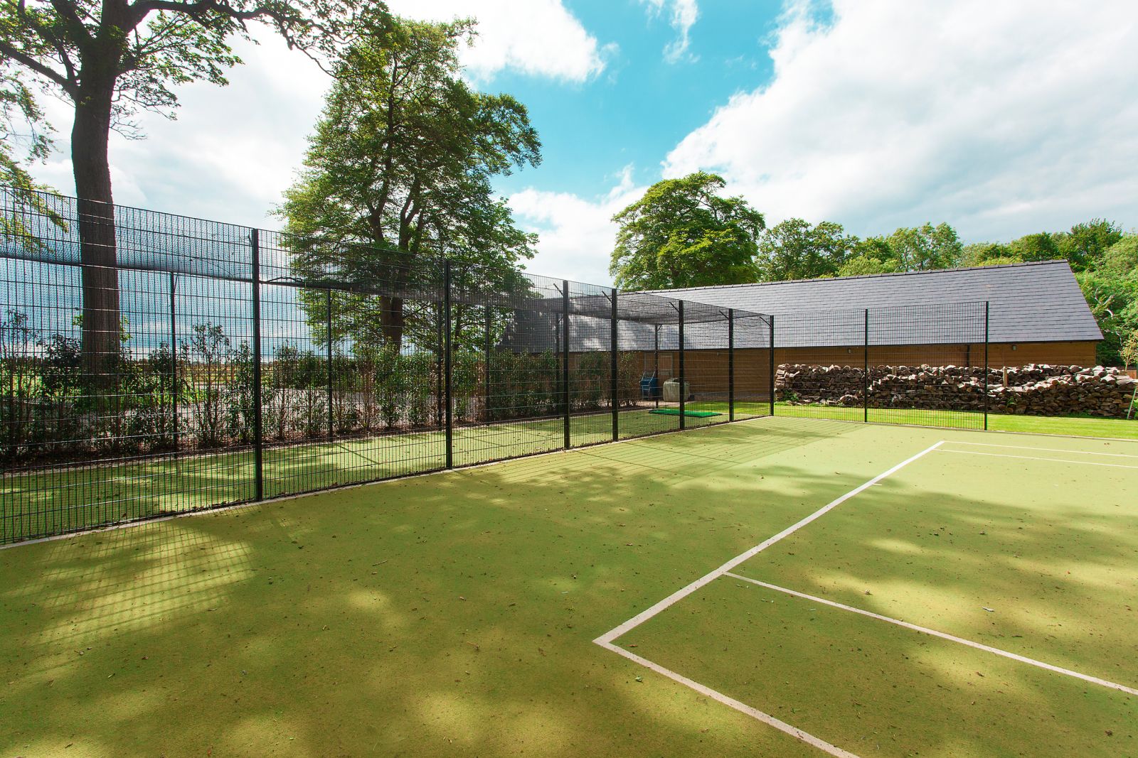 the tennis court at woodstock lodge