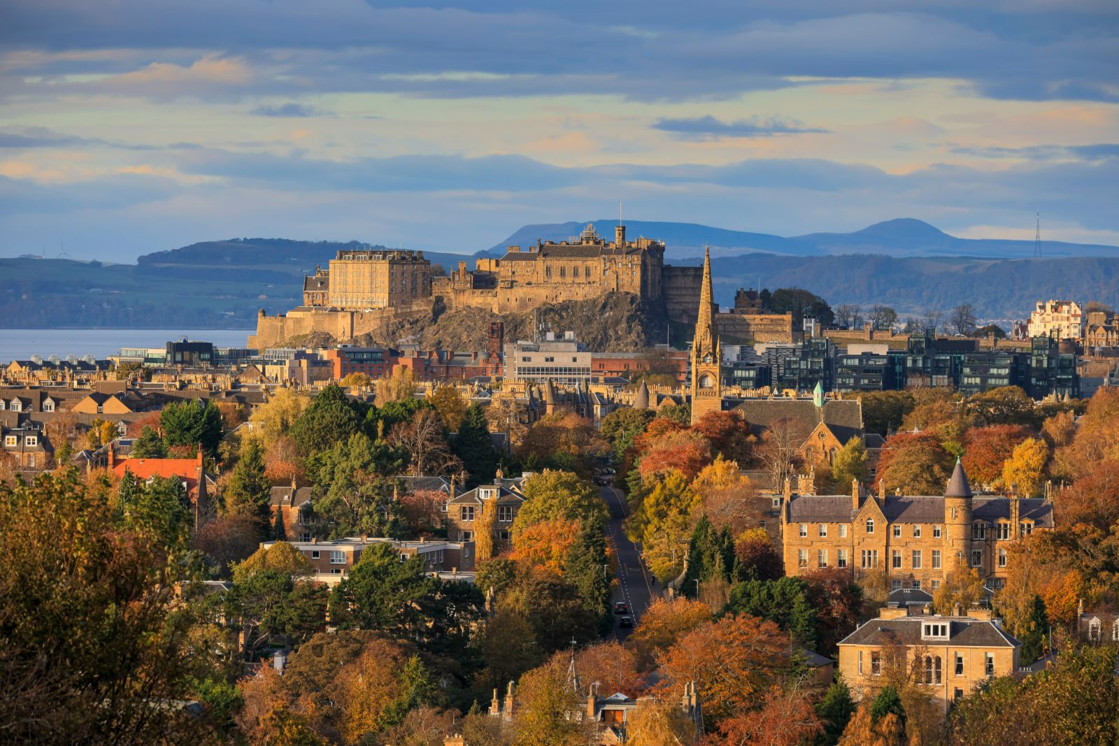 Edinburgh city skyline and distant view of Edinburgh Castle