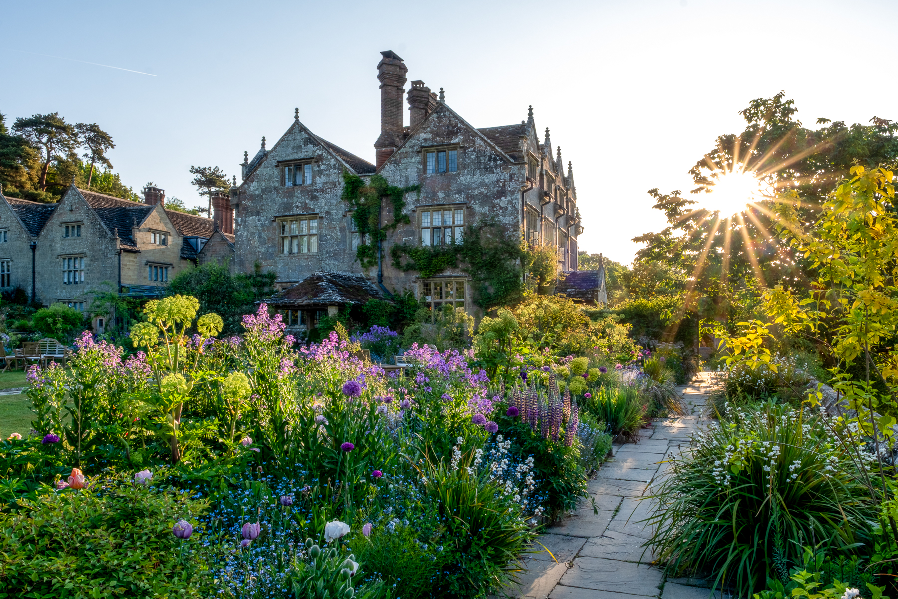 Exterior view of the building and gardens at Gravetye Manor in the United Kingdom