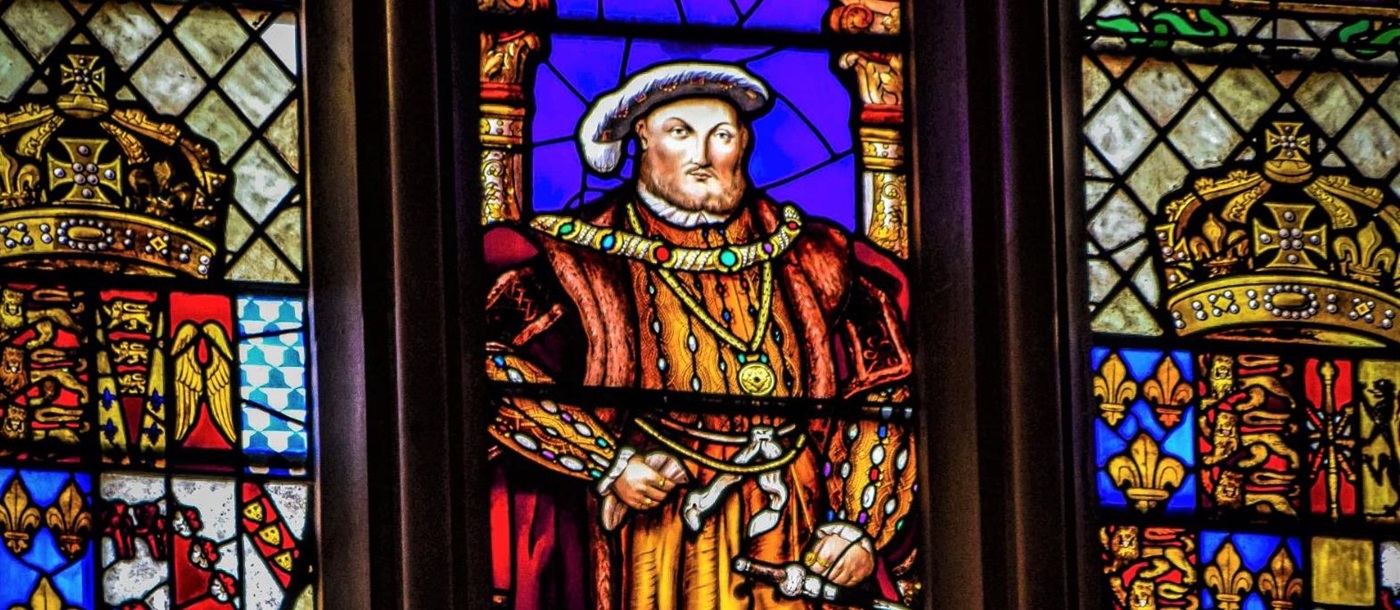 Henry VIII depicted on a stained glass window in Hampton Court, London