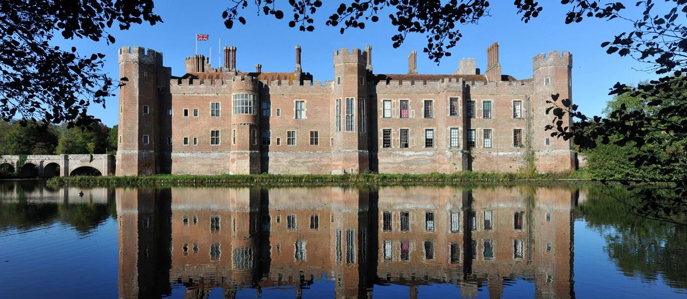 Herstmonceux house reflected on the lake in Sussex England