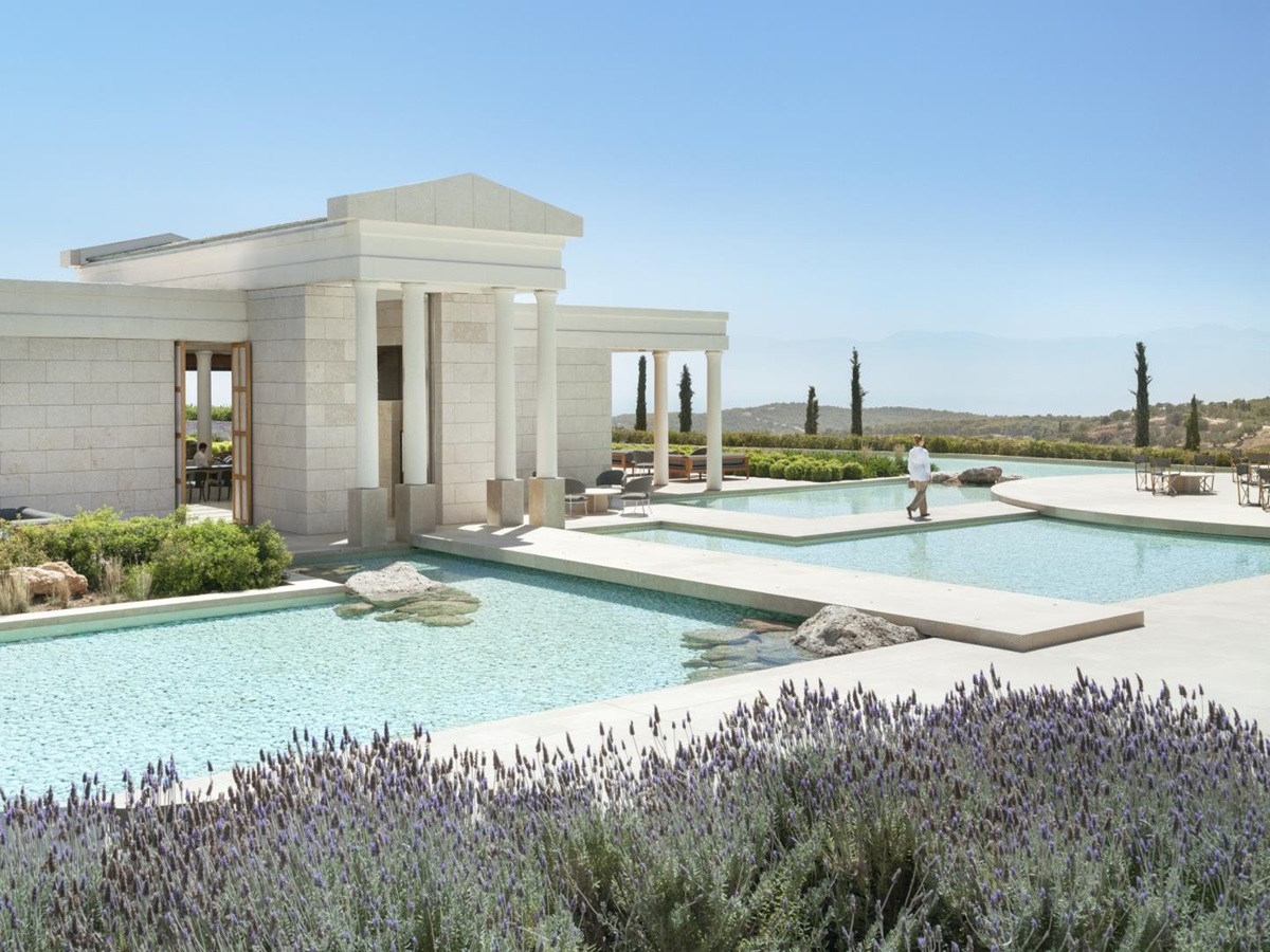 Ancient Greek style white building with pillars - the arrival pavilion at Amanzoe