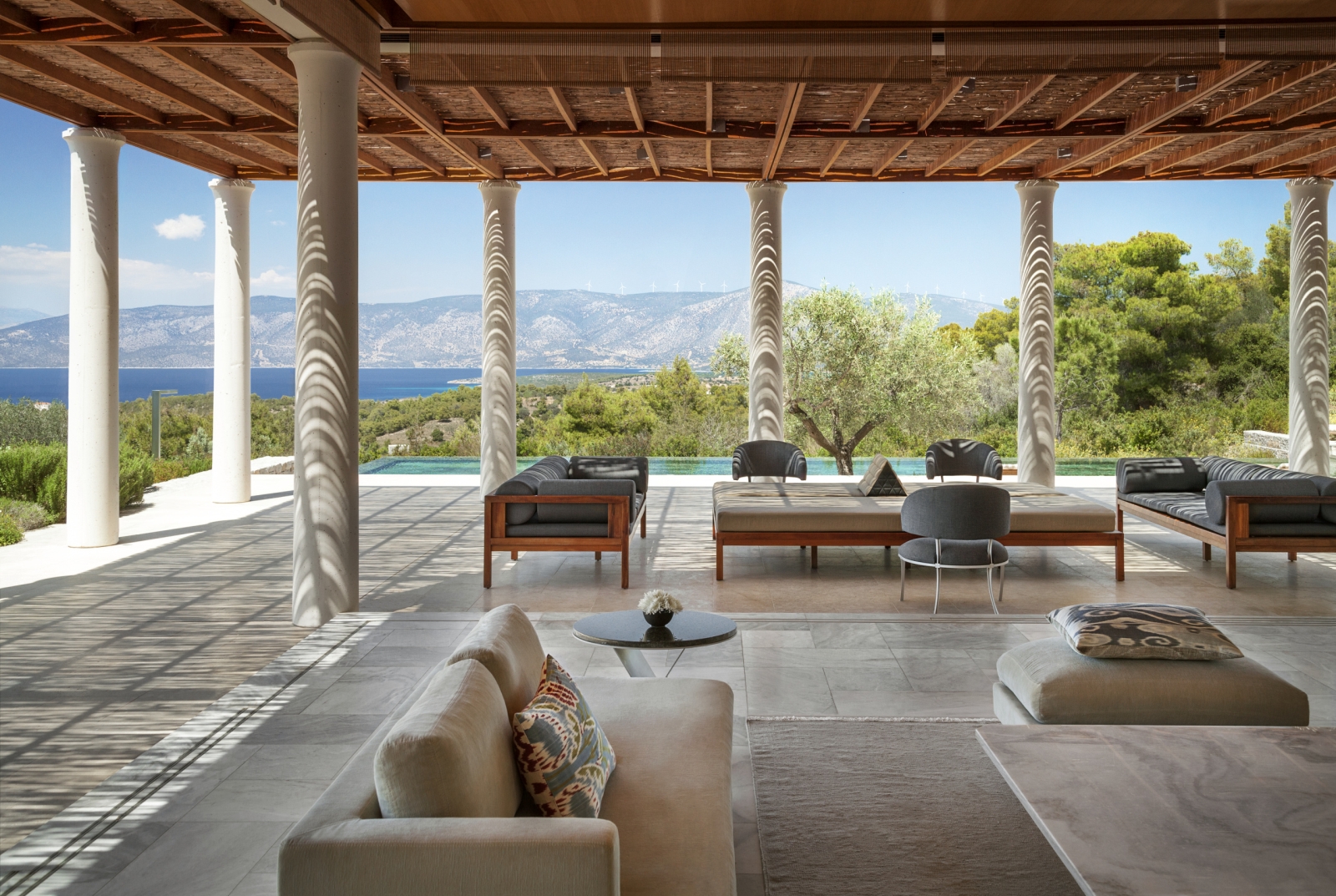 Outdoor living room with private pool overlooking the Aegan Sea