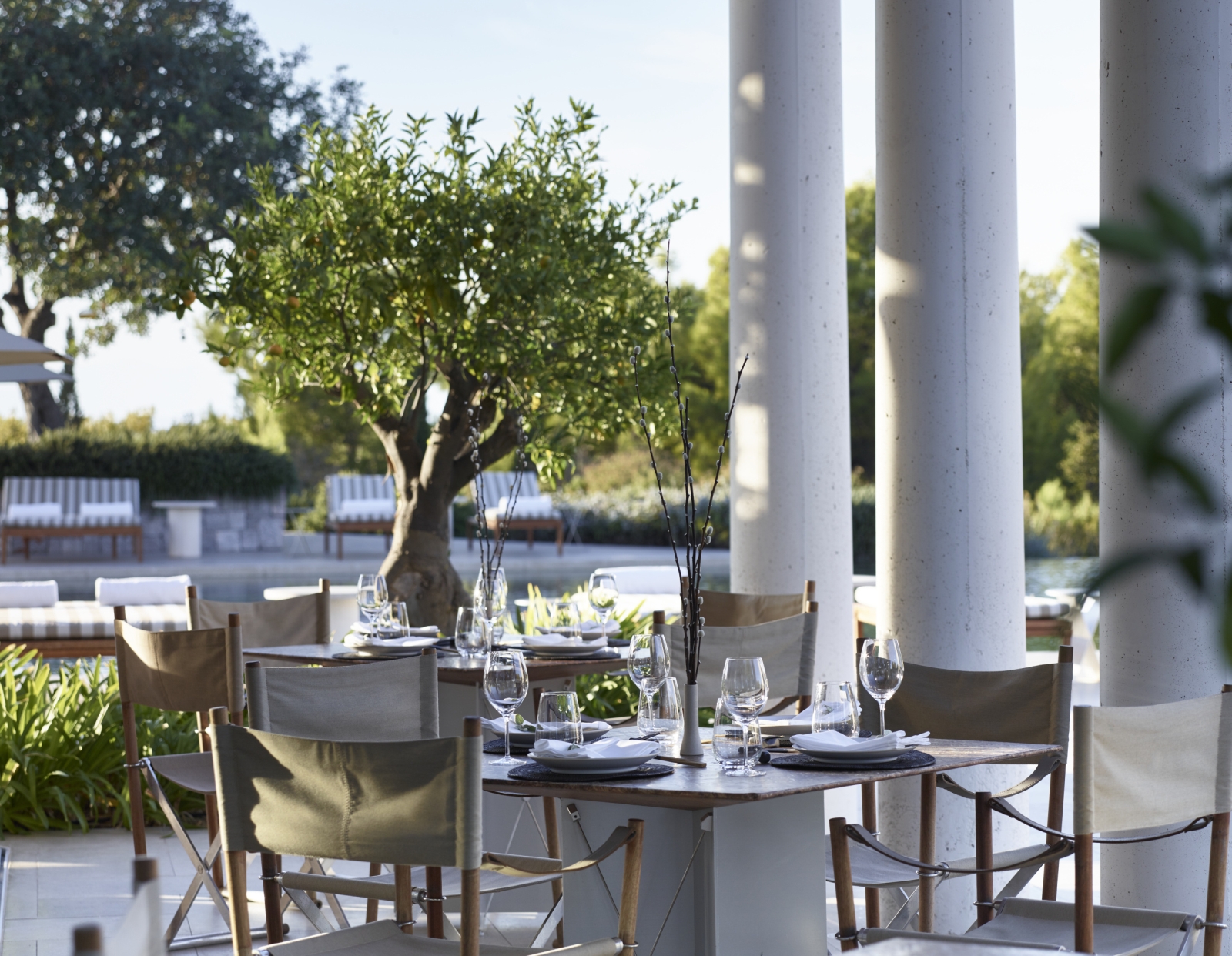 Pool-side restaurant set for dinner