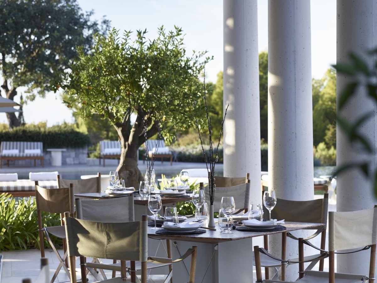 Pool-side restaurant set for dinner