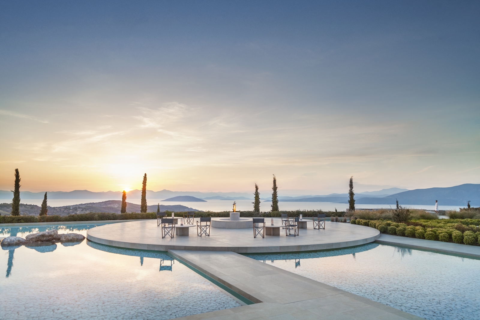 The main terrace, a white, round and seemingly floating piece of marble set in a pool and overlooking the Aegan Sea