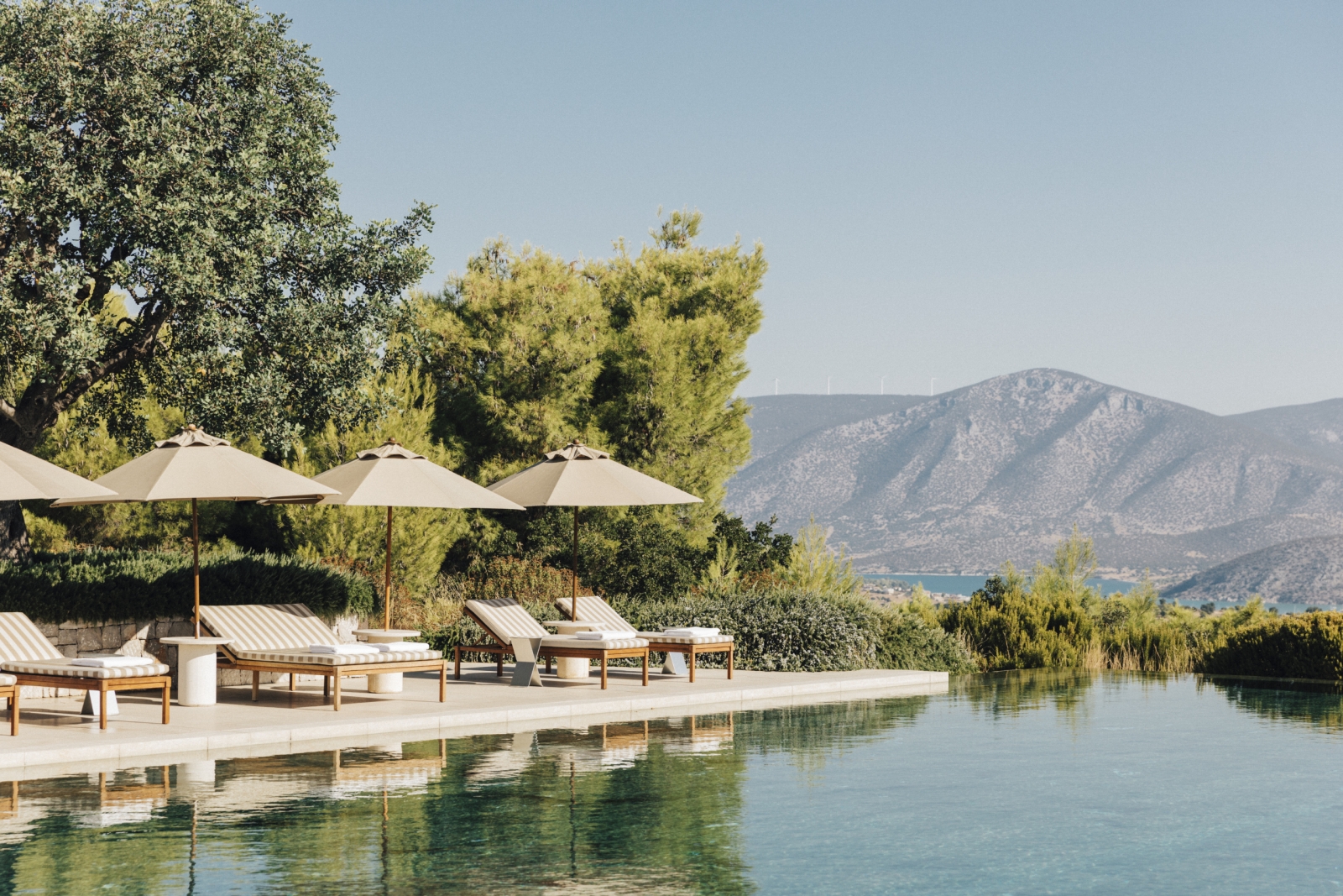 Pool and loungers at Amanzoe