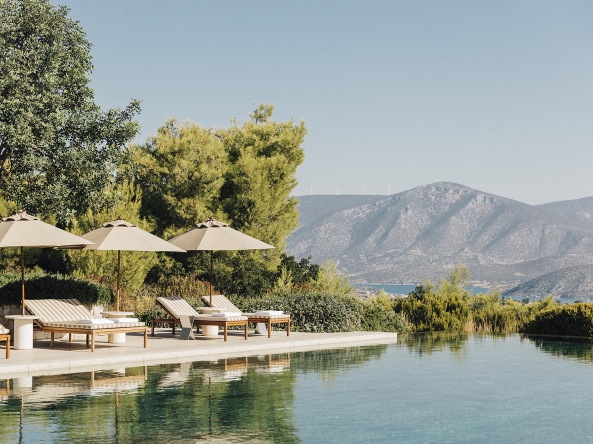 Pool and loungers at Amanzoe
