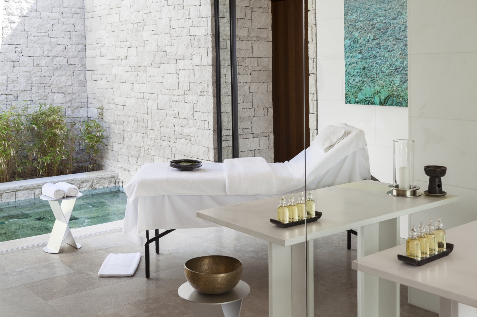 Open treatment room with plunge pool