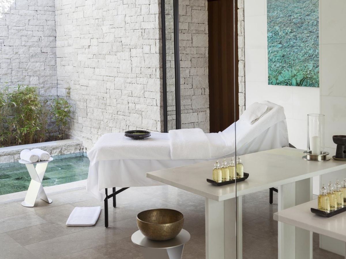 Open treatment room with plunge pool