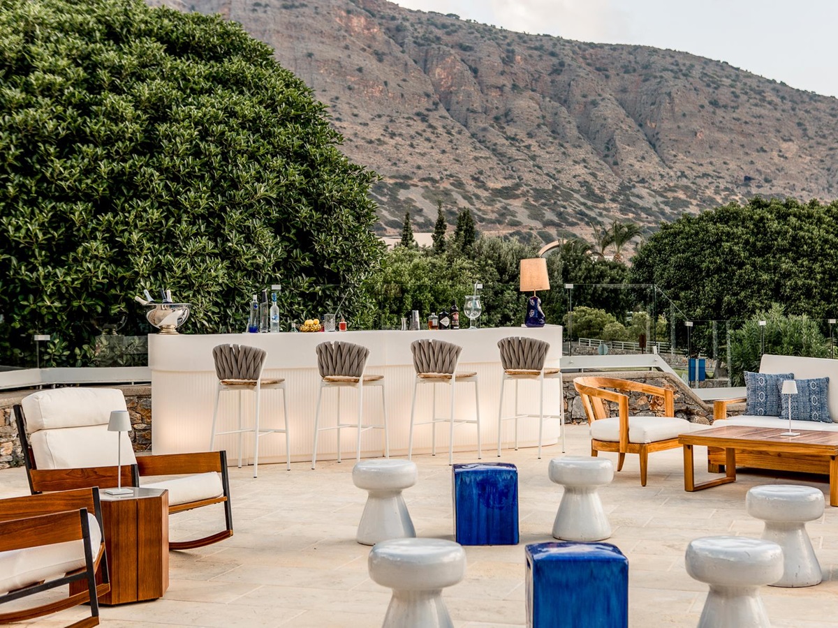 Patio seating area at Phāea Blue Palace in Crete