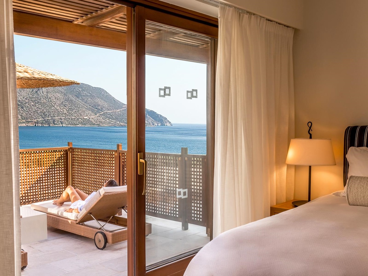 Private terrace and guest suite at Phāea Blue Palace in Crete