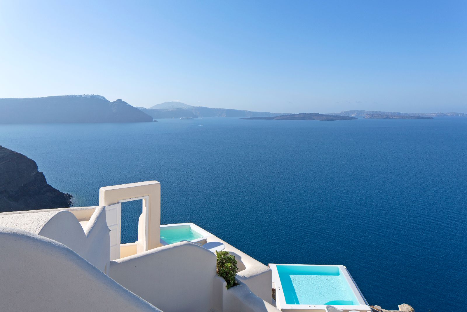 Aerial view of Canaves Oia Suites in Santorini Greece