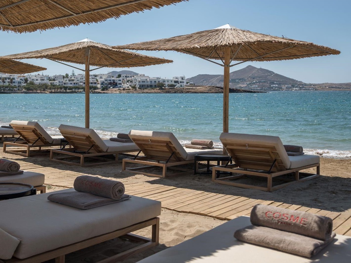 Sun loungers on the private beach at the Cosme Resort in Paros Greece