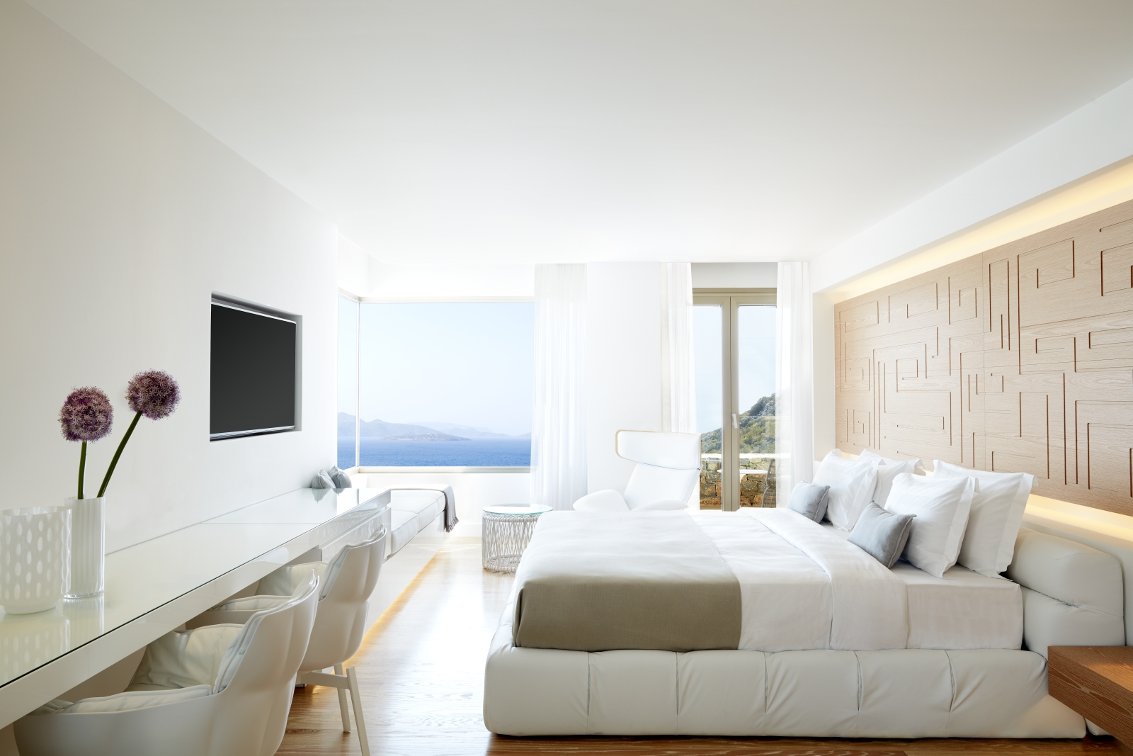 Master Bedroom of a Mansion with sea views and flat screen TV at luxury resort Daios Cove in Greece