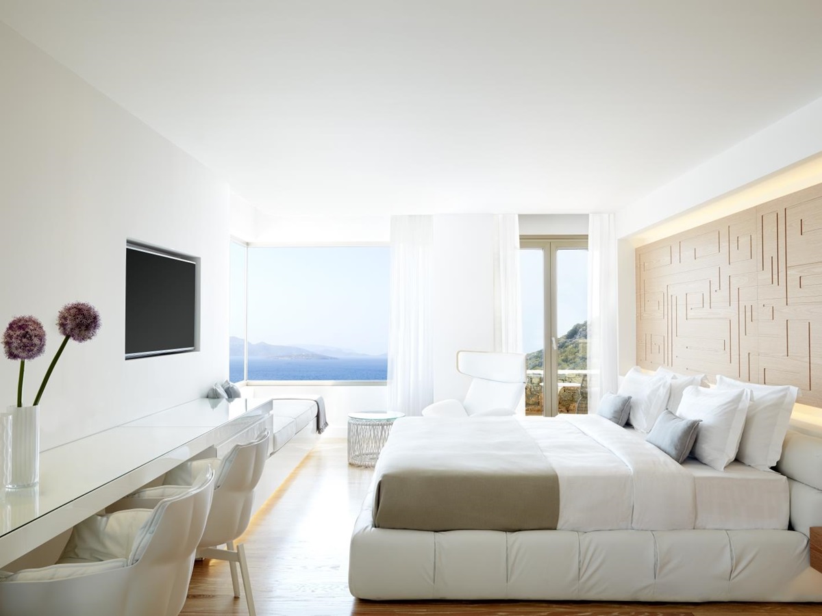 Master Bedroom of a Mansion with sea views and flat screen TV at luxury resort Daios Cove in Greece