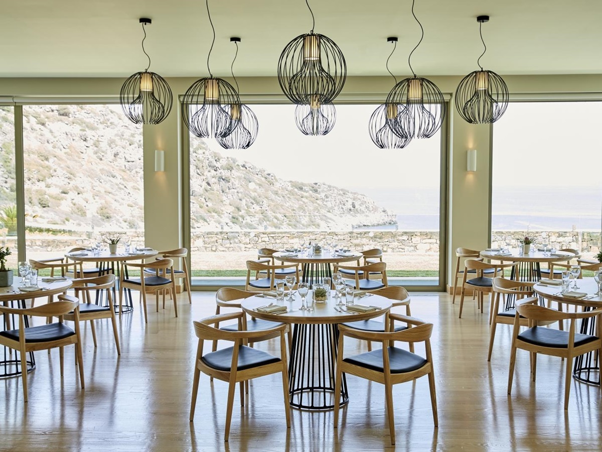 Spacious dining area at Pangea Restaurant at luxury resort Daios Cove in Greece