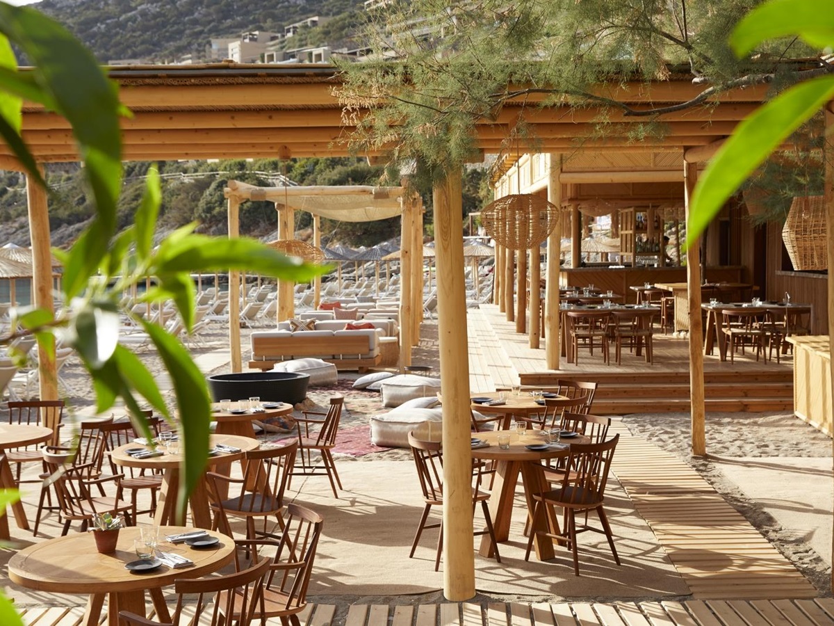 Relaxed beach front restaurant and bar The Beach House at luxury resort Daios Cove in Greece