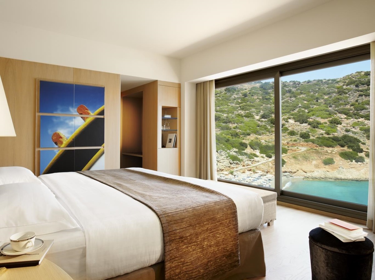Bedroom in one of the villas at luxury resort Daios Cove in Greece