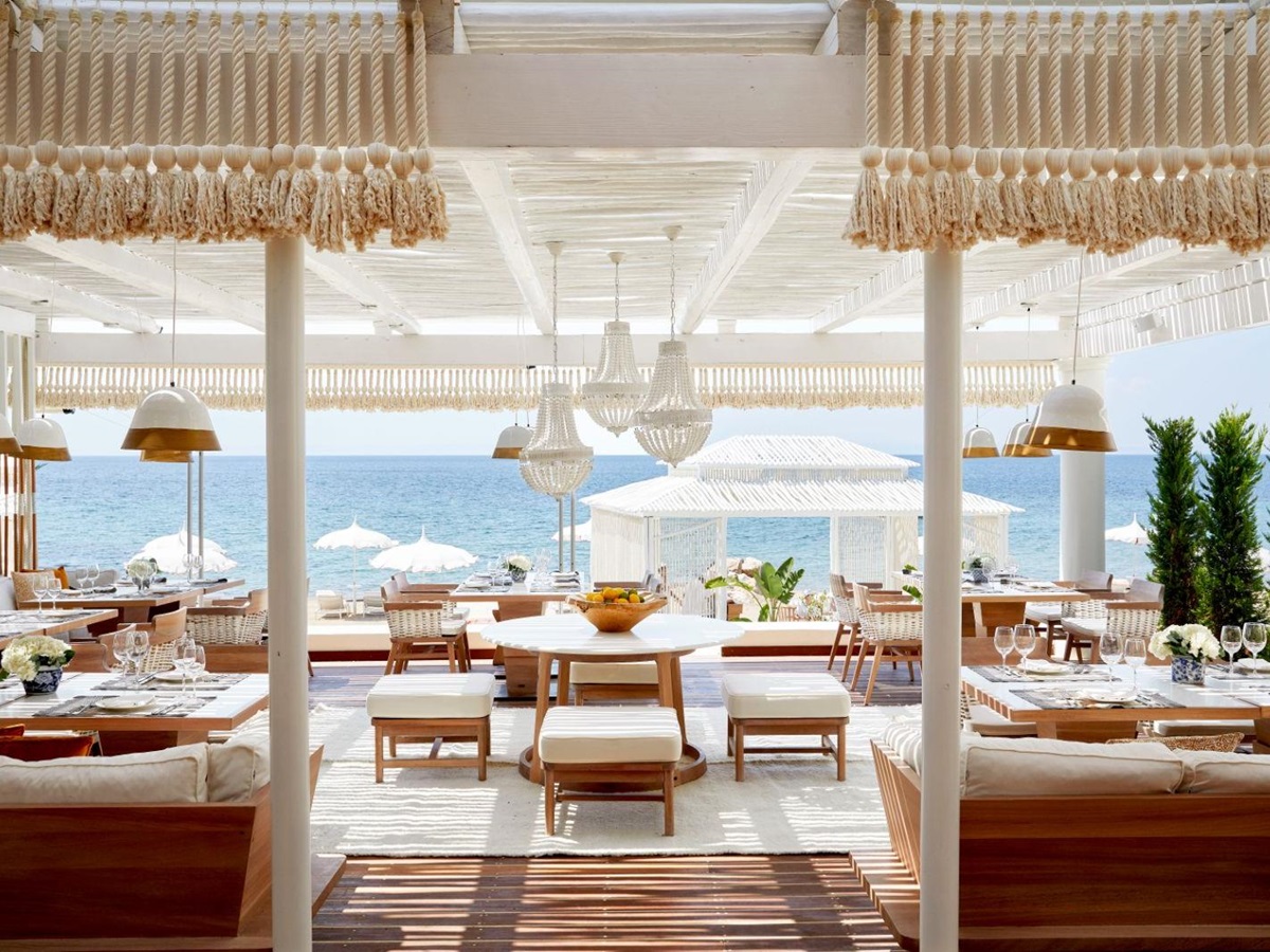 Dining with a seaview at Anithos Restaurant at luxury resort Danai Beach in Greece
