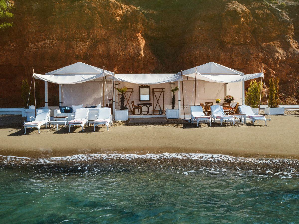 Sun loungers on the beach at luxury resort Danai Beach in Greece