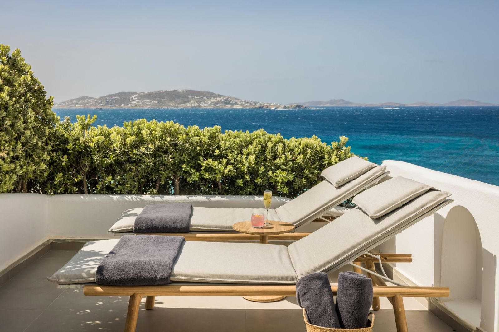 Loungers on a terrace at Grace Mykonos