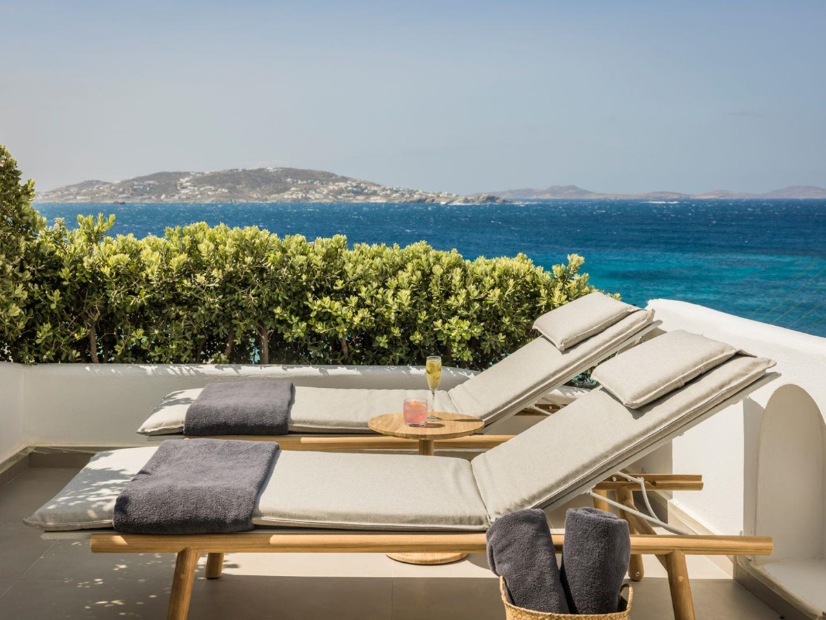 Loungers on a terrace at Grace Mykonos