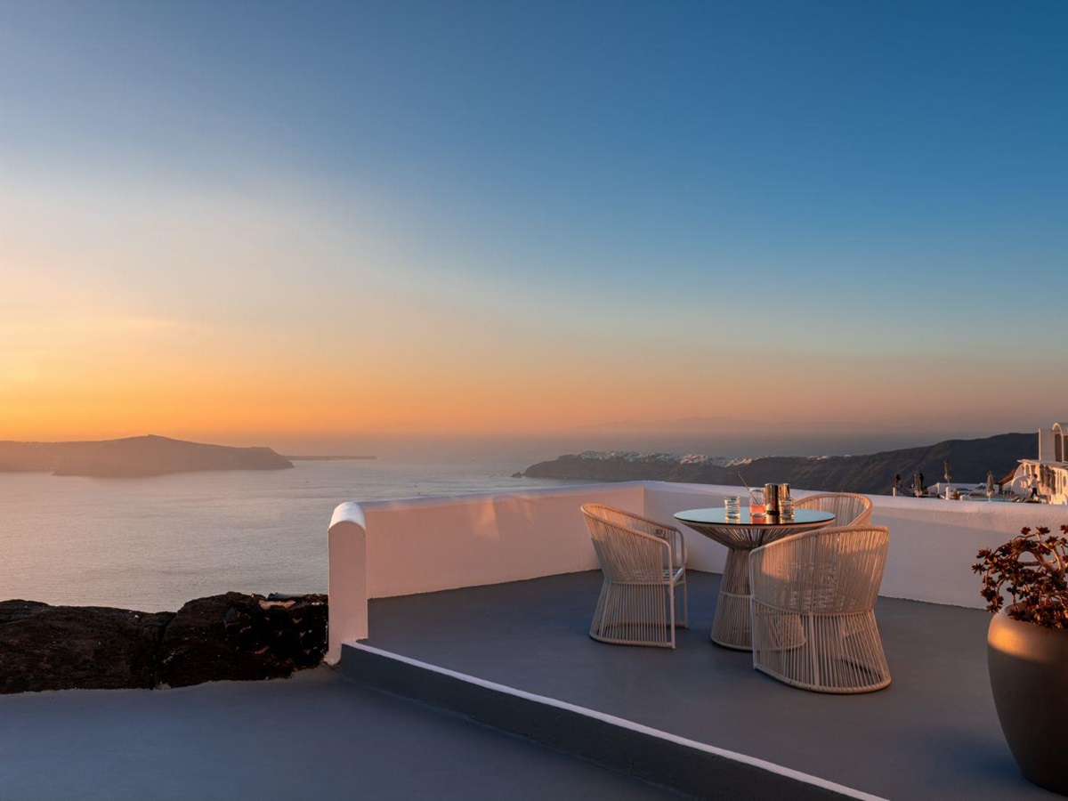 Dining table on the terrace at Grace Santorini