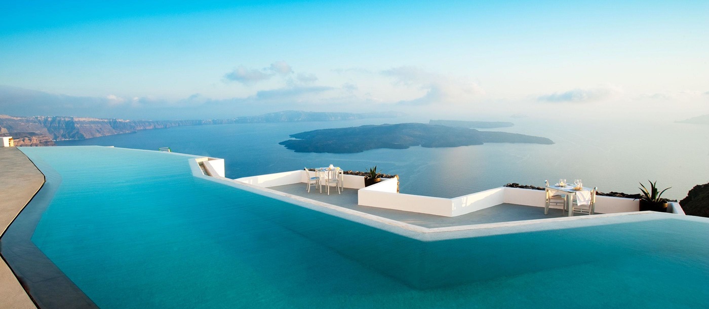The infinity pool with sea view from Grace Hotel Santorini in Mykonos, Greece