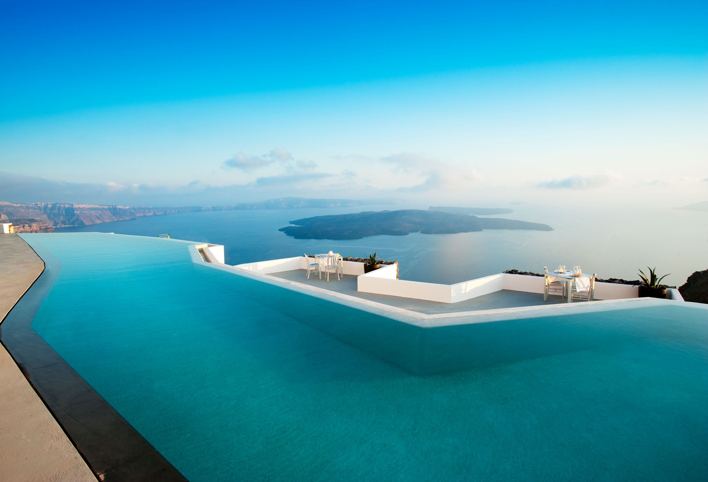 The infinity pool with sea view from Grace Hotel Santorini in Mykonos, Greece