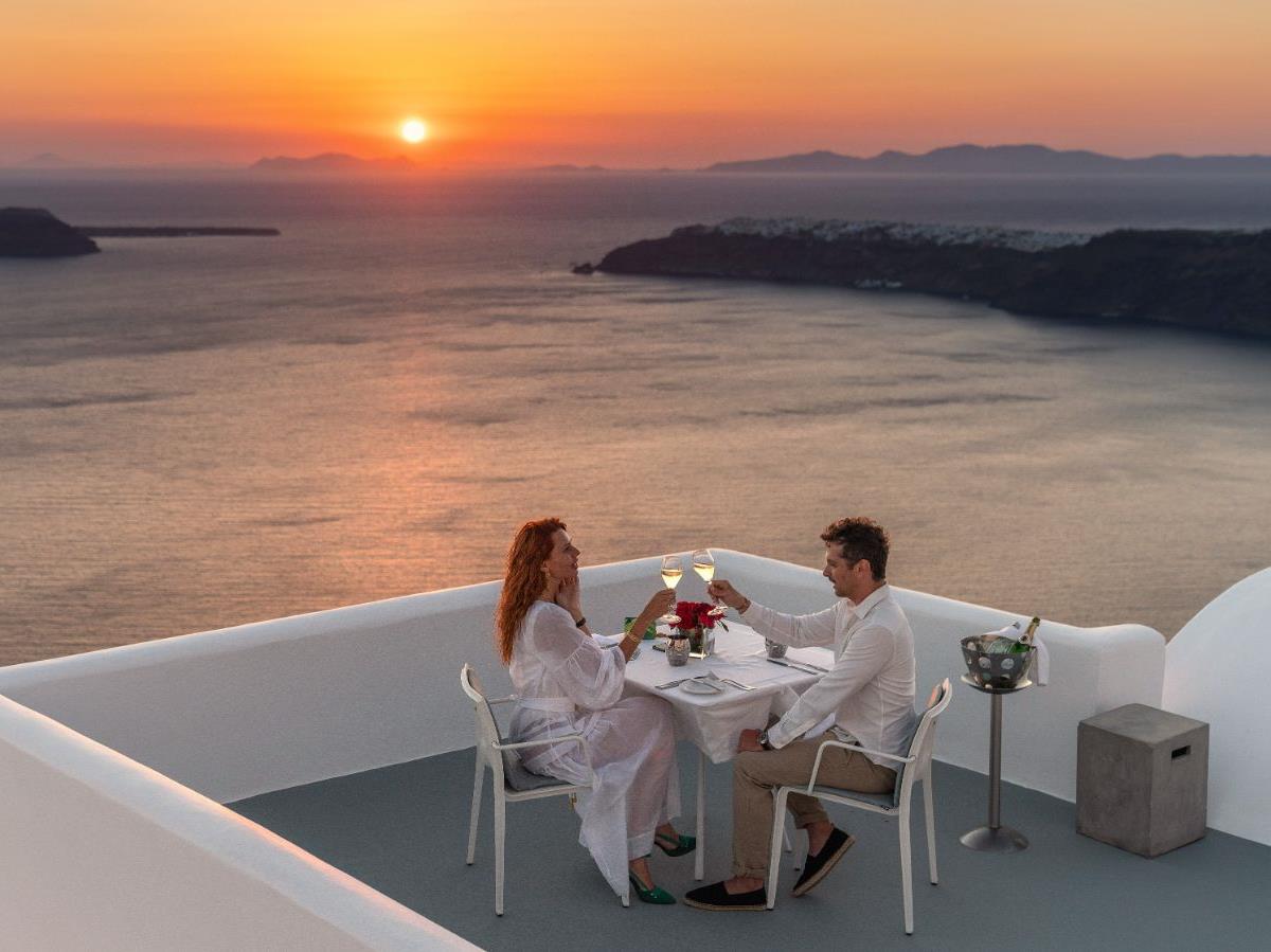 Romantic private dining on the terrace at Grace Santorini